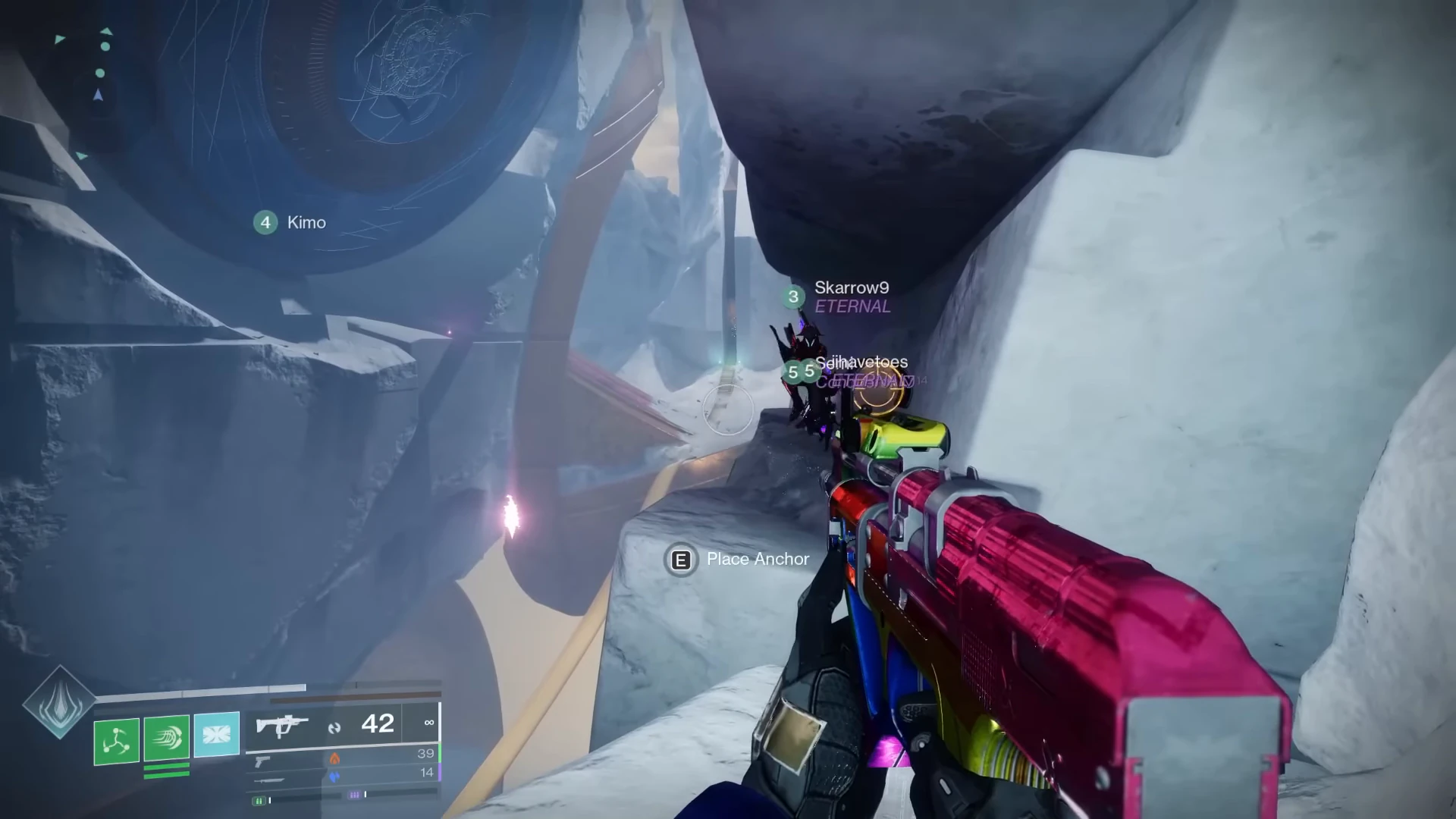 Stay right and squeeze onto the narrow ledge beside the huge circular wall disc.